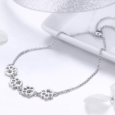 Pulsera ajustable de plata de ley con huella de pata de perro